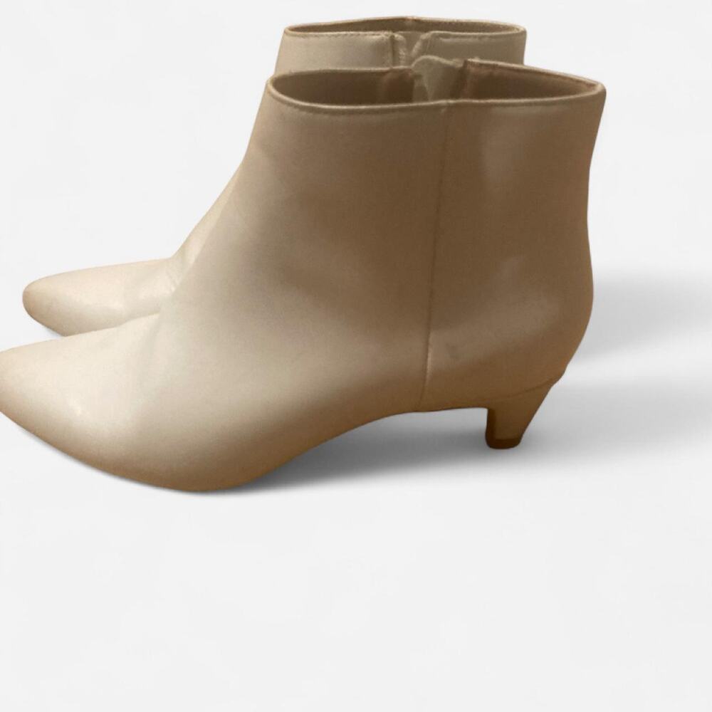 White ankle boots with a